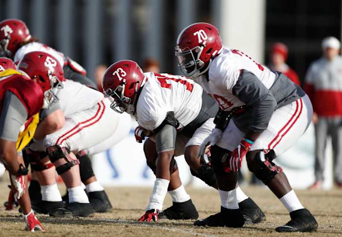 Alabama offensive linemen Evan Neal and Alex Leatherwood